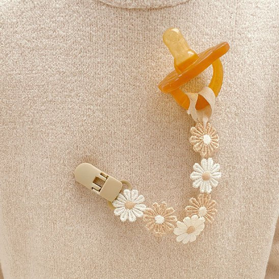 attache tetine motif fleur
