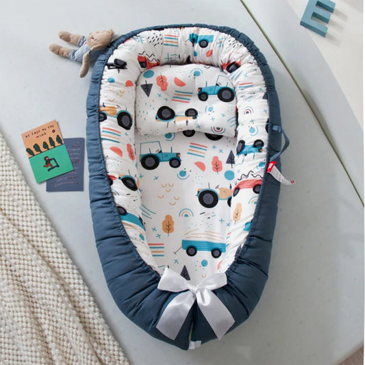 nid d'ange bebe bleu voiture