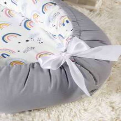 nid d'ange bebe  arc en ciel noeud